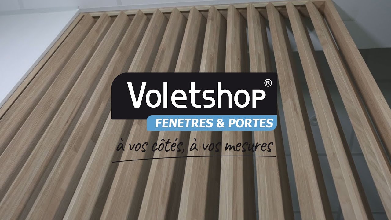 Claustra bois à lames orientables.